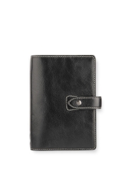 Experience the blend of informal luxury and functionality with the Malden Personal Organiser in black. Crafted in premium full-grain leather, this captivating organiser offers various features including a week-to-week calendar, a vast selection of lined and clean papers, and multiple pockets for your convenience. Its contrasting stitching and stylish design make it an essential accessory for the organised individual.