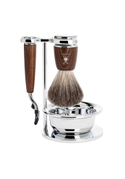Experience the ultimate grooming experience with Rytmo Set 4 Steamed Ash Pure Badger Mach3. This premium 4-piece shaving set boasts durable chrome-plated metal parts, precision-crafted ash wood handles and a badger bristle brush for a refreshing start to your day. A timeless combination of style and quality, it's the perfect accessory for any classic shave enthusiast.