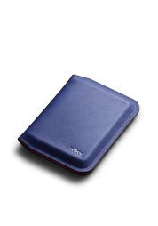 Discover the epitome of style and innovation with the Apex Slim Sleeve Wallet in Indigo . Carefully crafted from premium materials, this wallet features a sleek, seamless profile and secure magnetic closure for seamless organization. Experience the perfect blend of form and function offered by this ultra-slim and durable wallet.