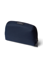 Keep your workspace clutter-free with Desk Caddy navy, perfectly designed to store all your small electronics and essentials. Armed with multiple compartments and a secret pocket, this compact case is waterproof, ensuring the safety of your items. Choose Desk Caddy for a smarter, more organized, and more stylish way to store your headphones, cables, keys, and pens.