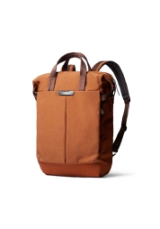 Enjoy the perfect combination of style and functionality with the compact bronze Tokyo Totepack. Made from 100% waterproof recycled fabric, this versatile accessory easily holds your laptop and essentials. Its intuitive design, lightweight design, and color selection make it a must-have for everyday use.