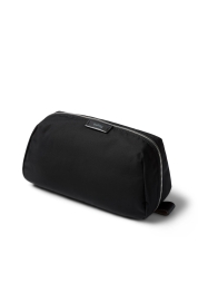 "We offer you the Toiletry Kit Plus toiletry bag in elegant black. This waterproof bag has many pockets of various sizes, an easy-to-clean interior and a trouble-free zipper. With a 3-year warranty and a loop for easy carrying, it is the ideal solution for all your travel needs."