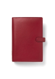 Show off your sophisticated side with the beautiful Finsbury Scarlet Personal Diary, crafted from uniquely soft leather. This diary offers versatile organisation with a calendar, to-do list, address book and multiple paper types. Convenient card pockets and a strap closure keep everything you need close at hand.